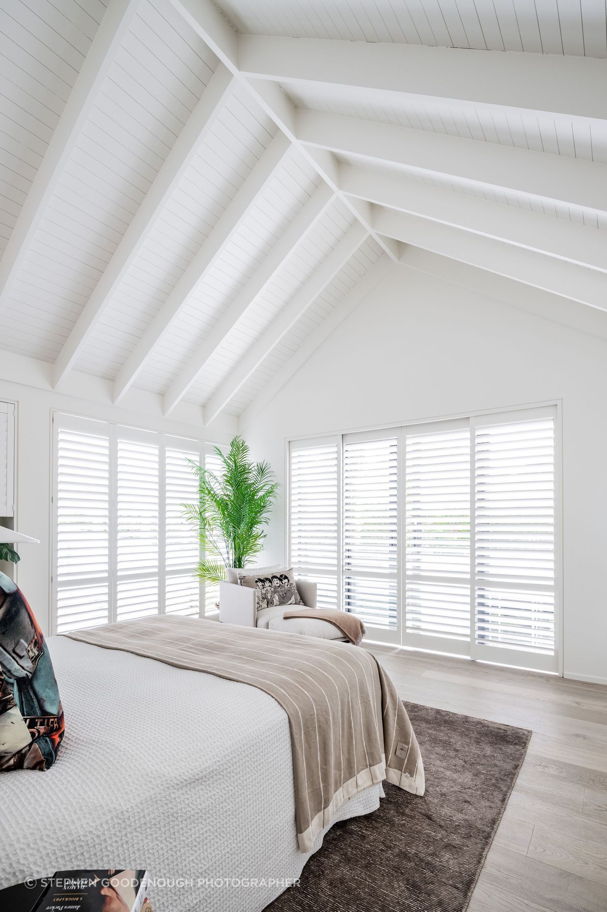 An upstairs bedroom makes the most of the gable form.