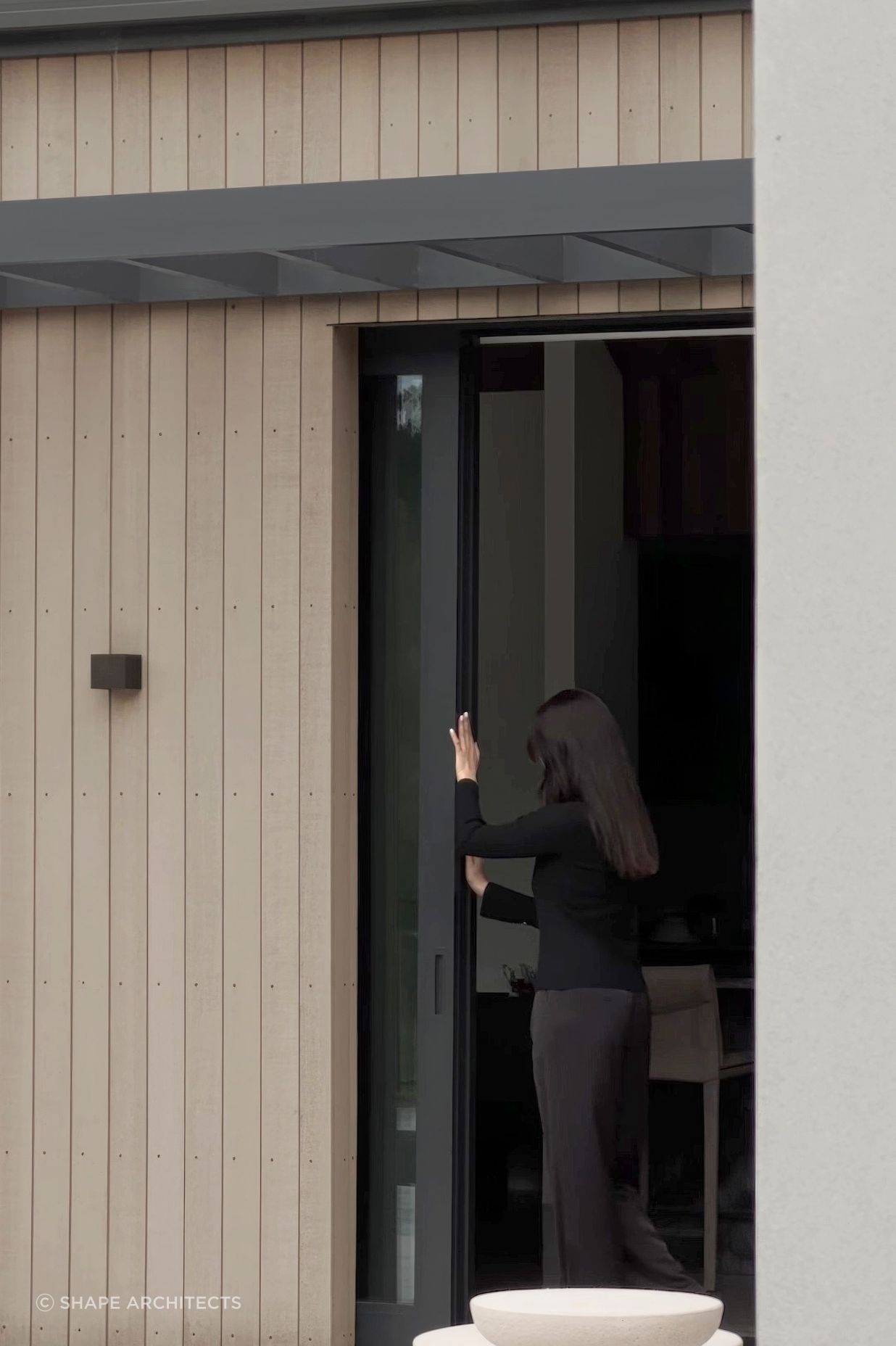 Sliding doors open to the outdoors