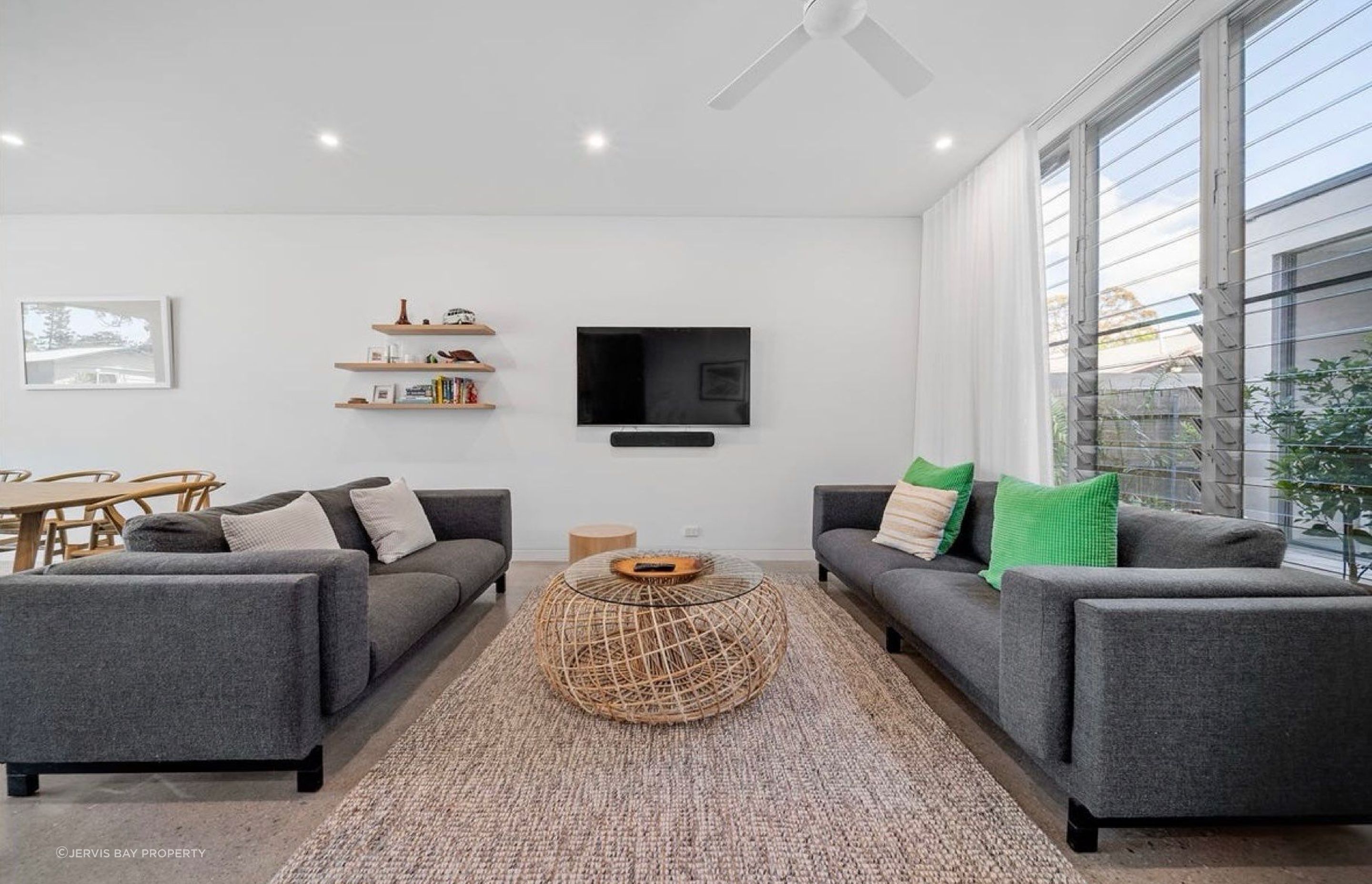 Generous proportions to the family lounge area with louvres providing the open connection-the difference between driving a sedan and a convertible