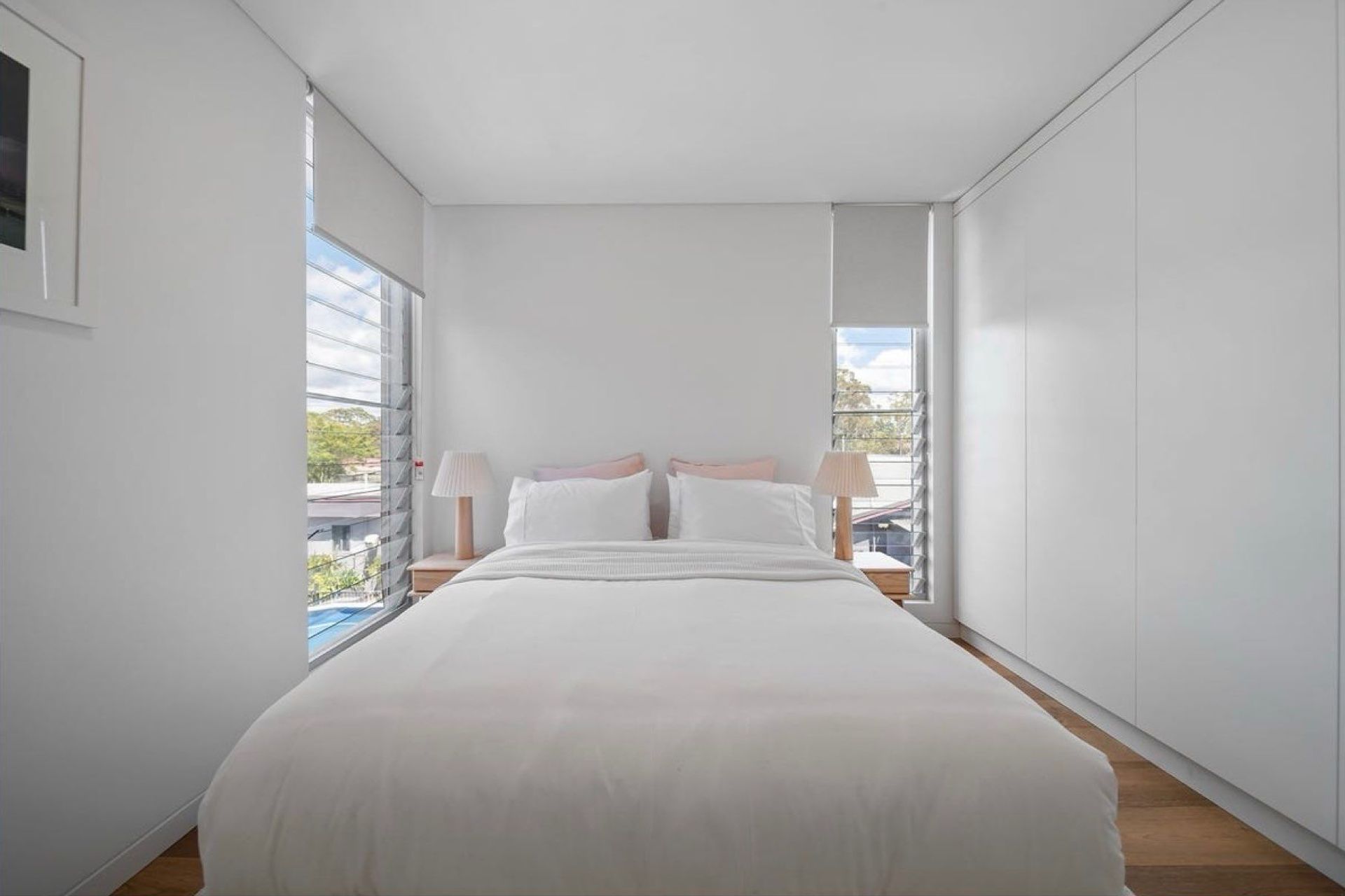 One of the four bedrooms per dwelling. Louvred windows allow for full crossflow ventilation