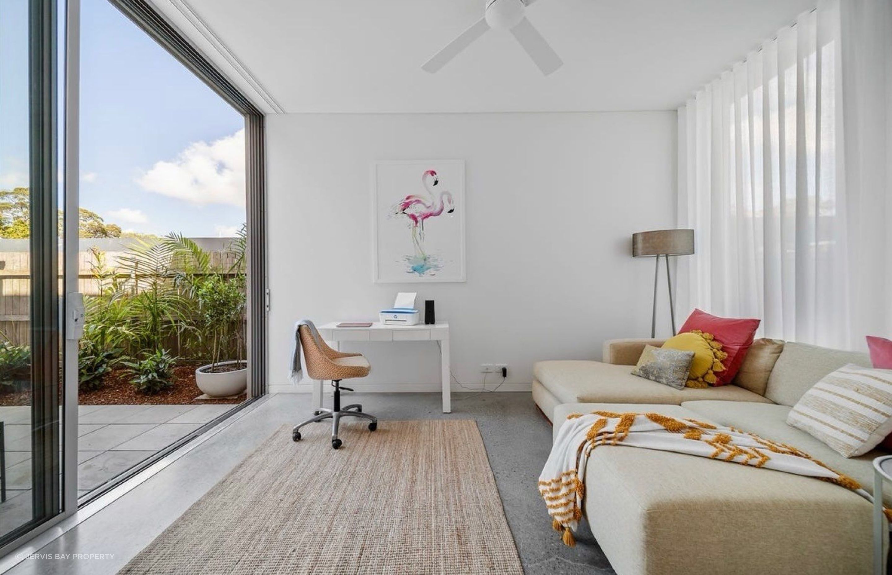 Home office to the front of the house keeps the main living areas private, and takes advantage of light from the courtyard and front garden