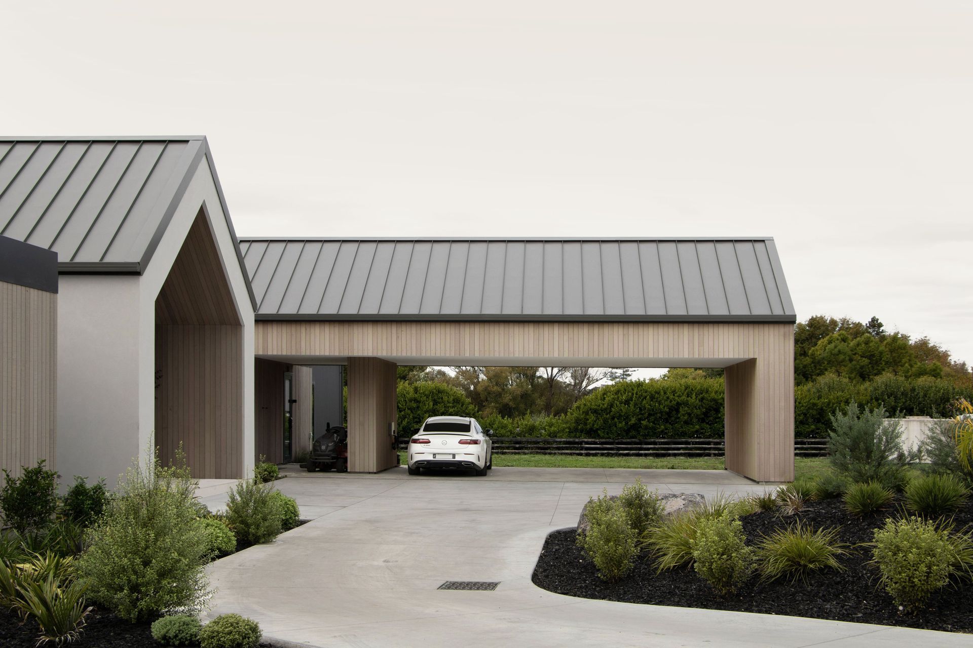 A classic looped driveway welcomes guests