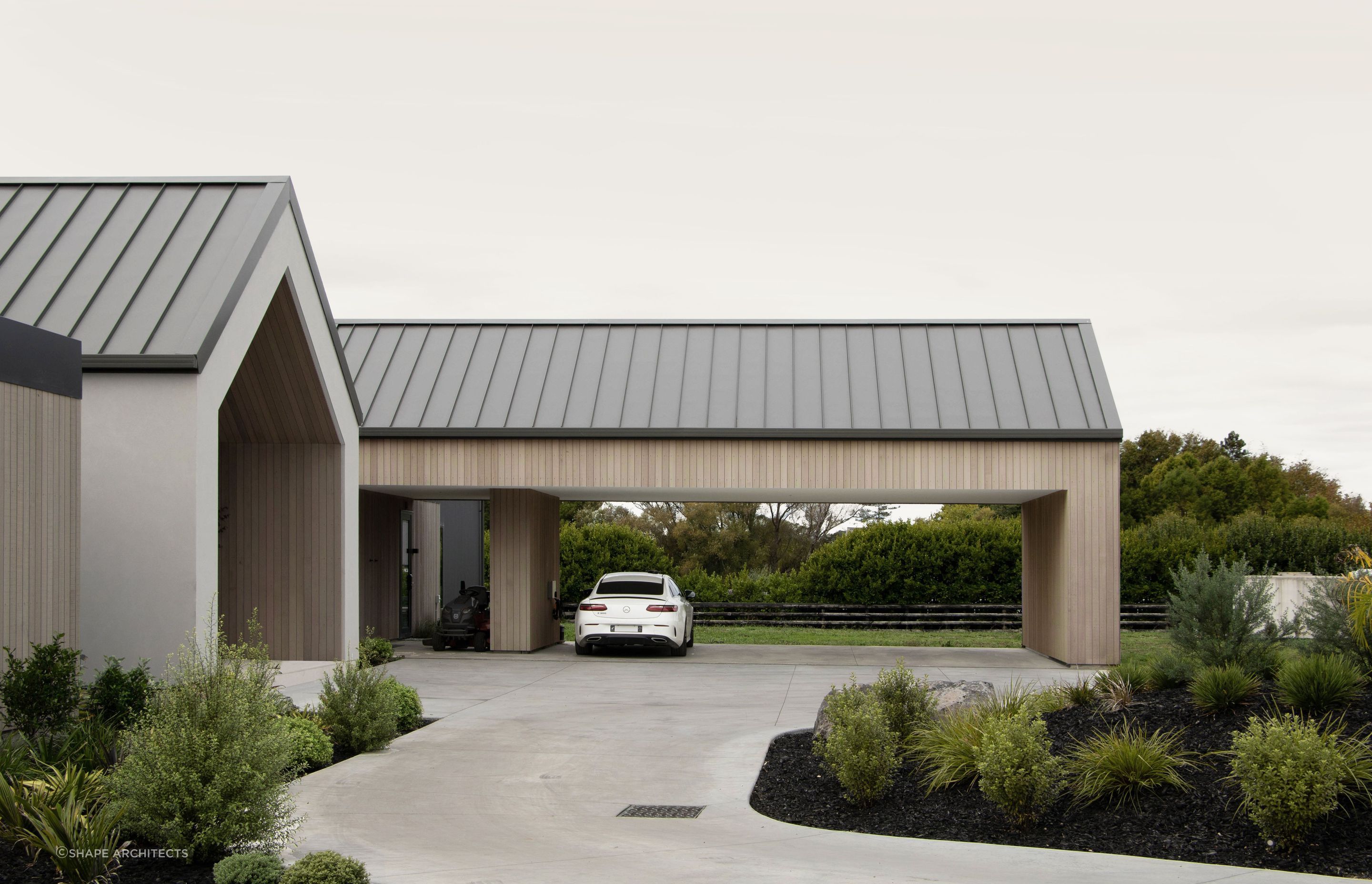 A classic looped driveway welcomes guests