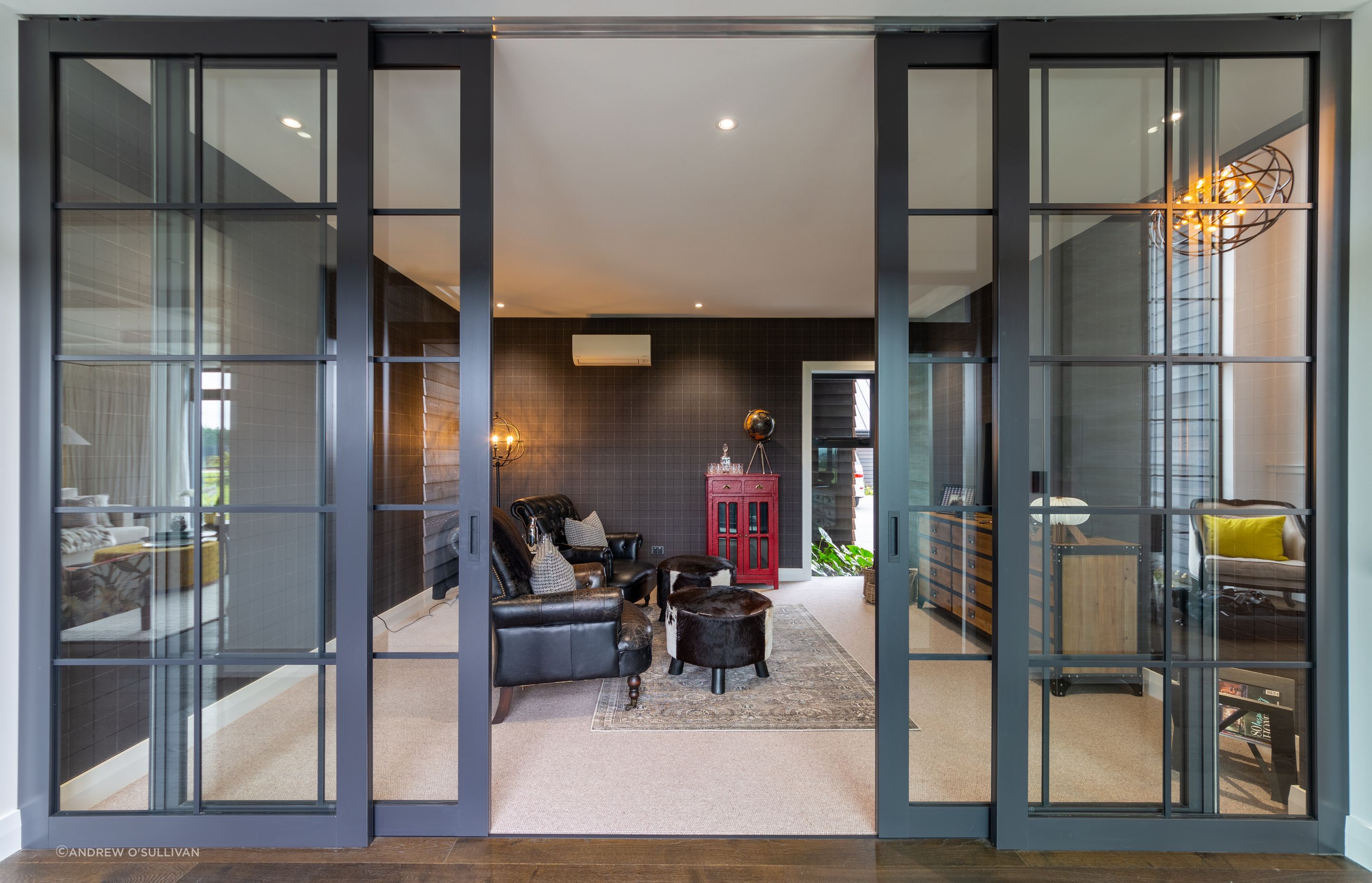 Internal joinery separates the snug adult's Whiskey Lounge from the hallway.