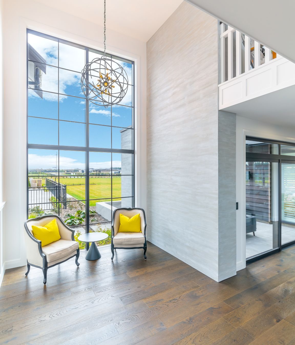 The single section of 5m high glazing in the entry foyer was carefully lifted into place by the team, and had to slot in neatly between the scaffolding  and the building.