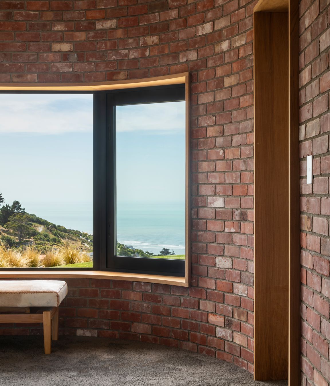 The internal facings of the pods are wrapped in recycled brick, complete with the traces of creeping vines.