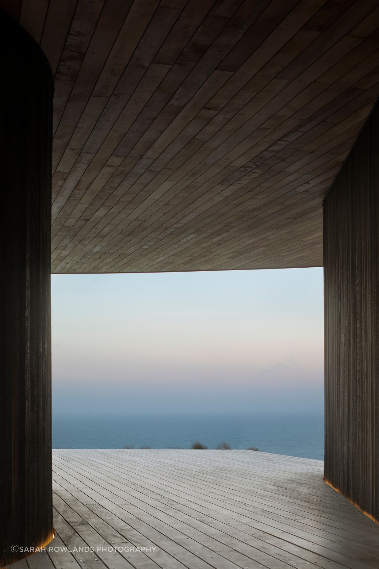 A dreamy view of the mist is captured from the breezeway between the house and garage pods.