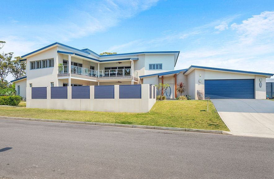 Two storey home overlook pool