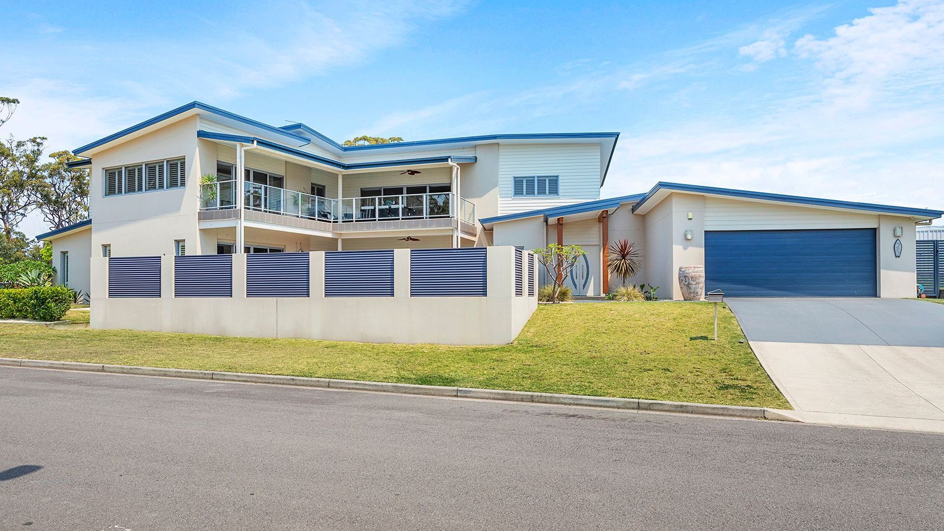 Two storey home overlook pool banner