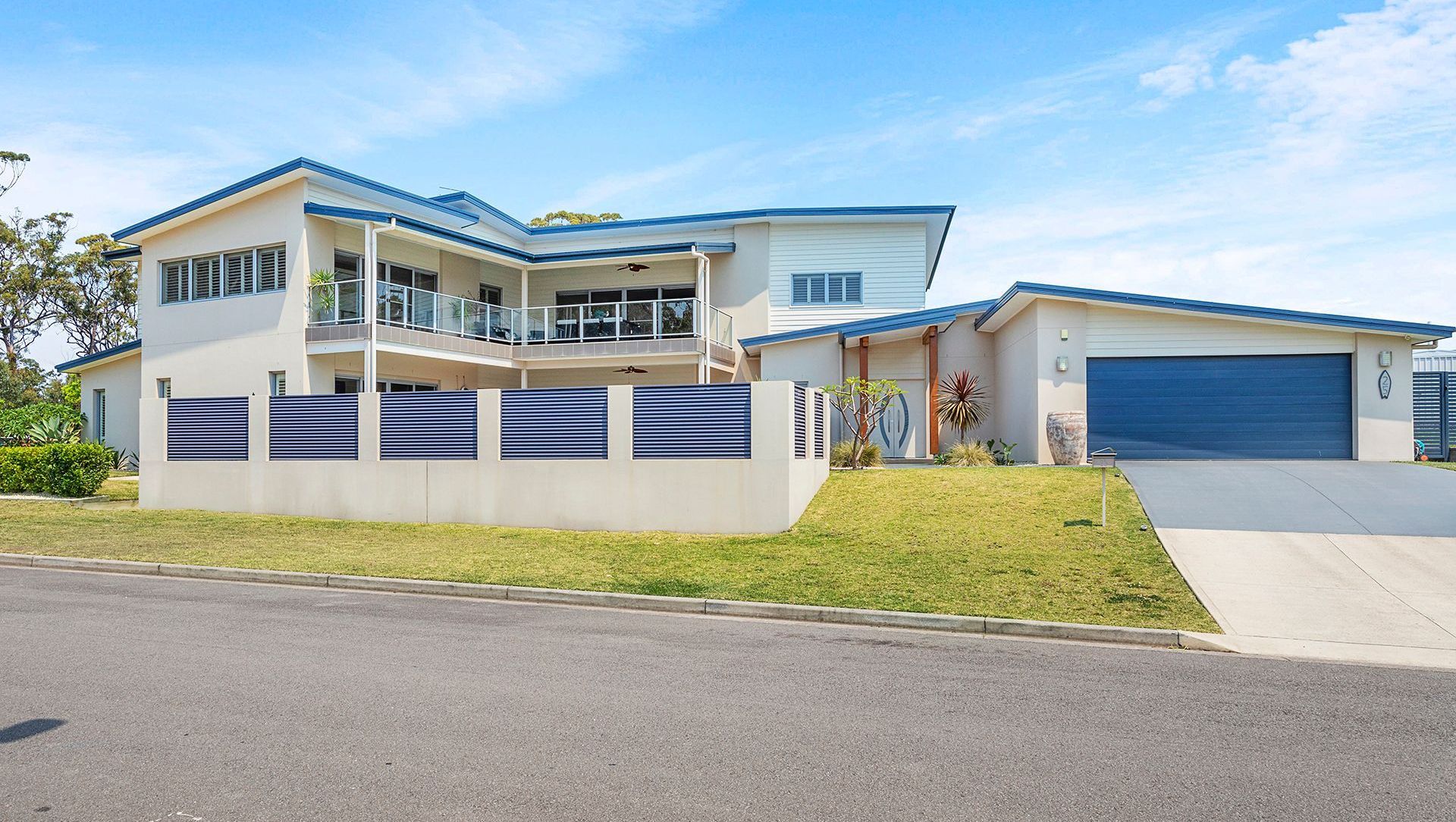 Two storey home overlook pool banner