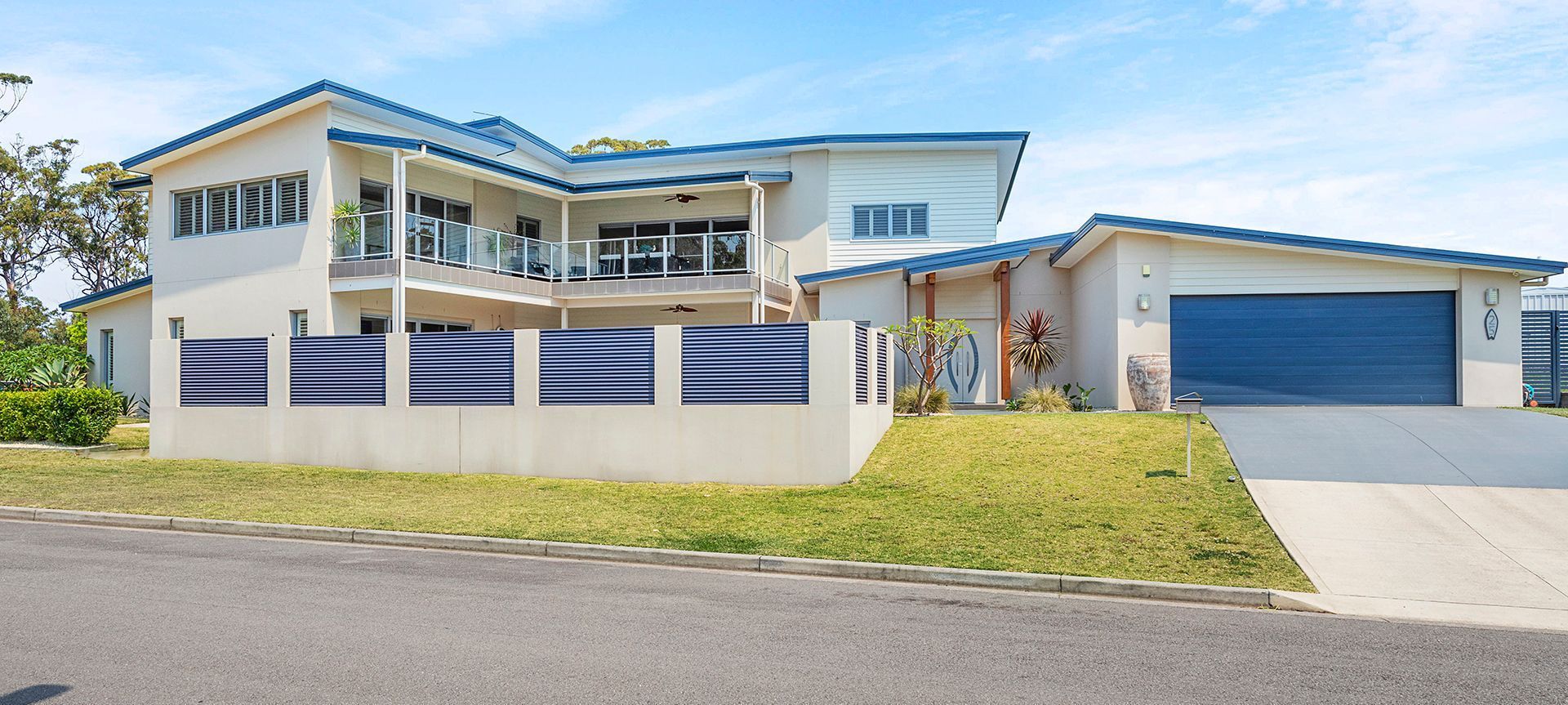 Two storey home overlook pool banner