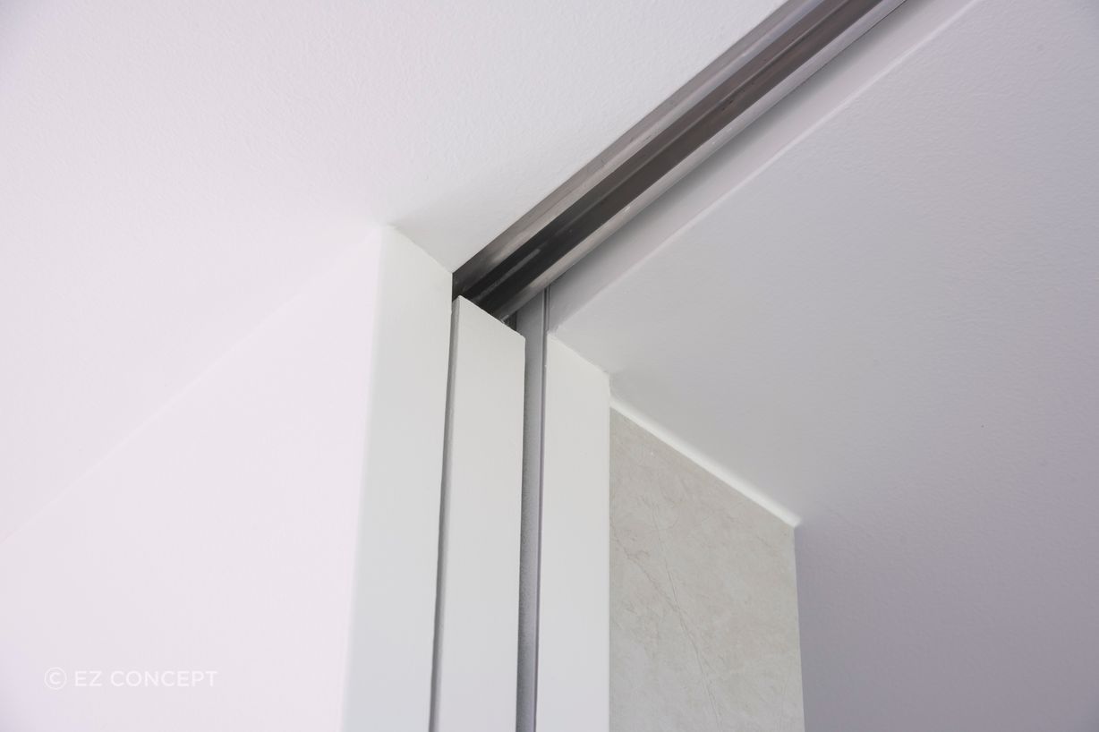 Matching the look of the EzyJamb doors, all the cavity sliders in the house are architrave-free using the SlideSet. This complete Cavity Slider leads through to the upstairs bathroom along with a number of wardrobes and walkways.