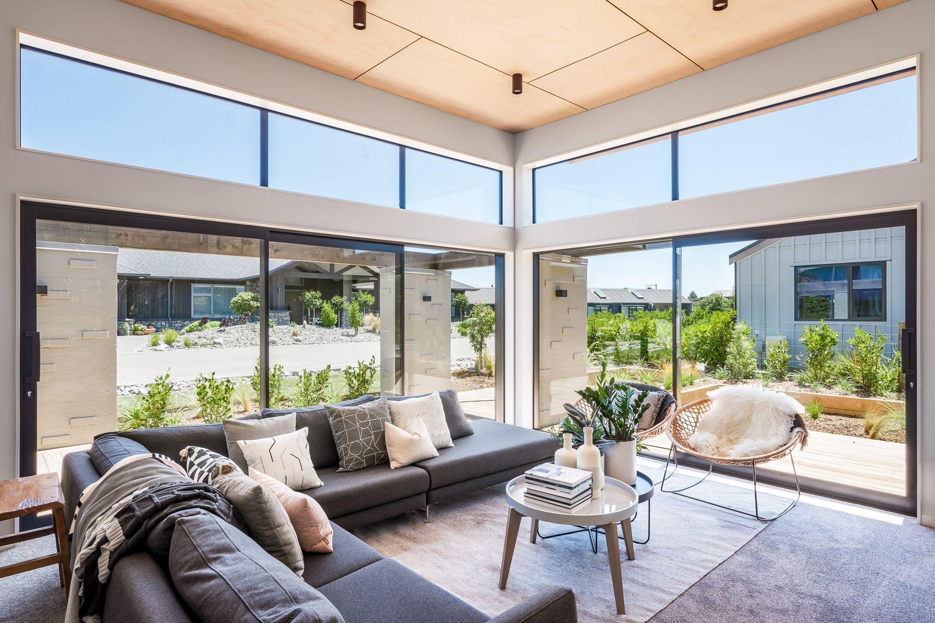 In the living area, the ceiling height reaches 3.6 metres and the clerestory windows help bring natural light into the interior as well as directing sightlines up and over the neighbouring property.