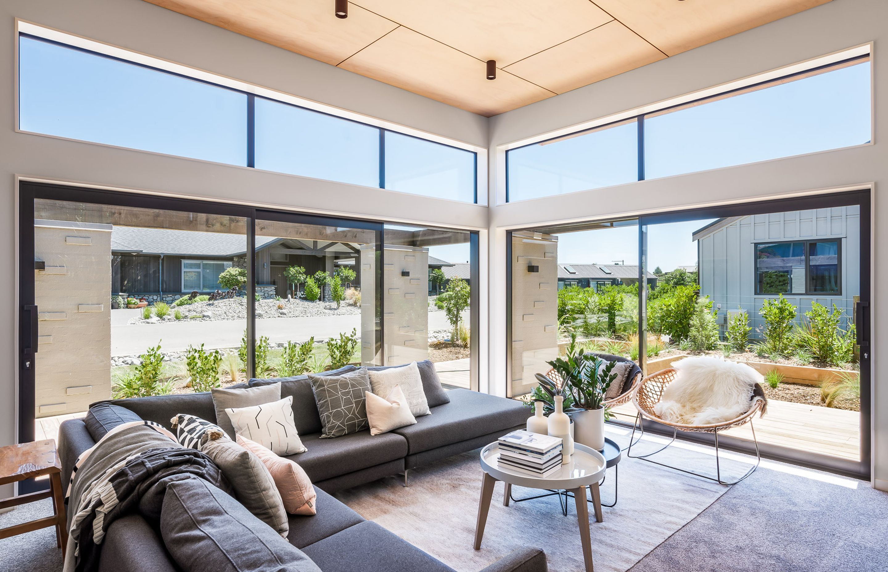 In the living area, the ceiling height reaches 3.6 metres and the clerestory windows help bring natural light into the interior as well as directing sightlines up and over the neighbouring property.