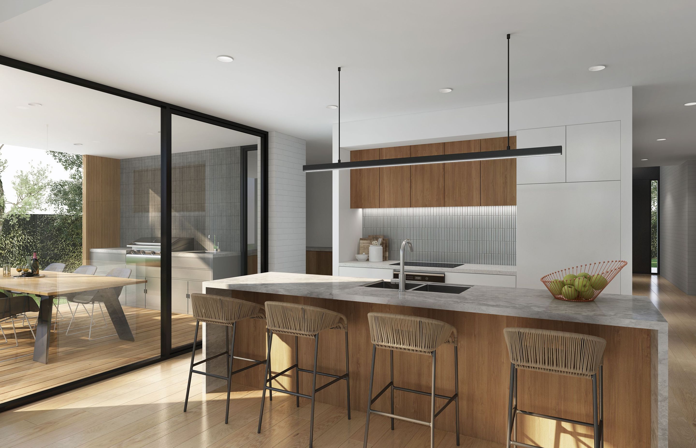 A central aspect of the shared living space, the open plan kitchen and dining area offer a multi-purpose, freeflowing environment that caters to all facets of family life. The kitchen is a blend of functionality and style, with timber veneer cabinetry, a central stone island bench and contemporary pendant lighting. The sleek European appliances are seamlessly integrated and the storage solutions intuitive. Dining can be enjoyed inside or out, with sliding glass doors leading smoothly to the terrace beyond.