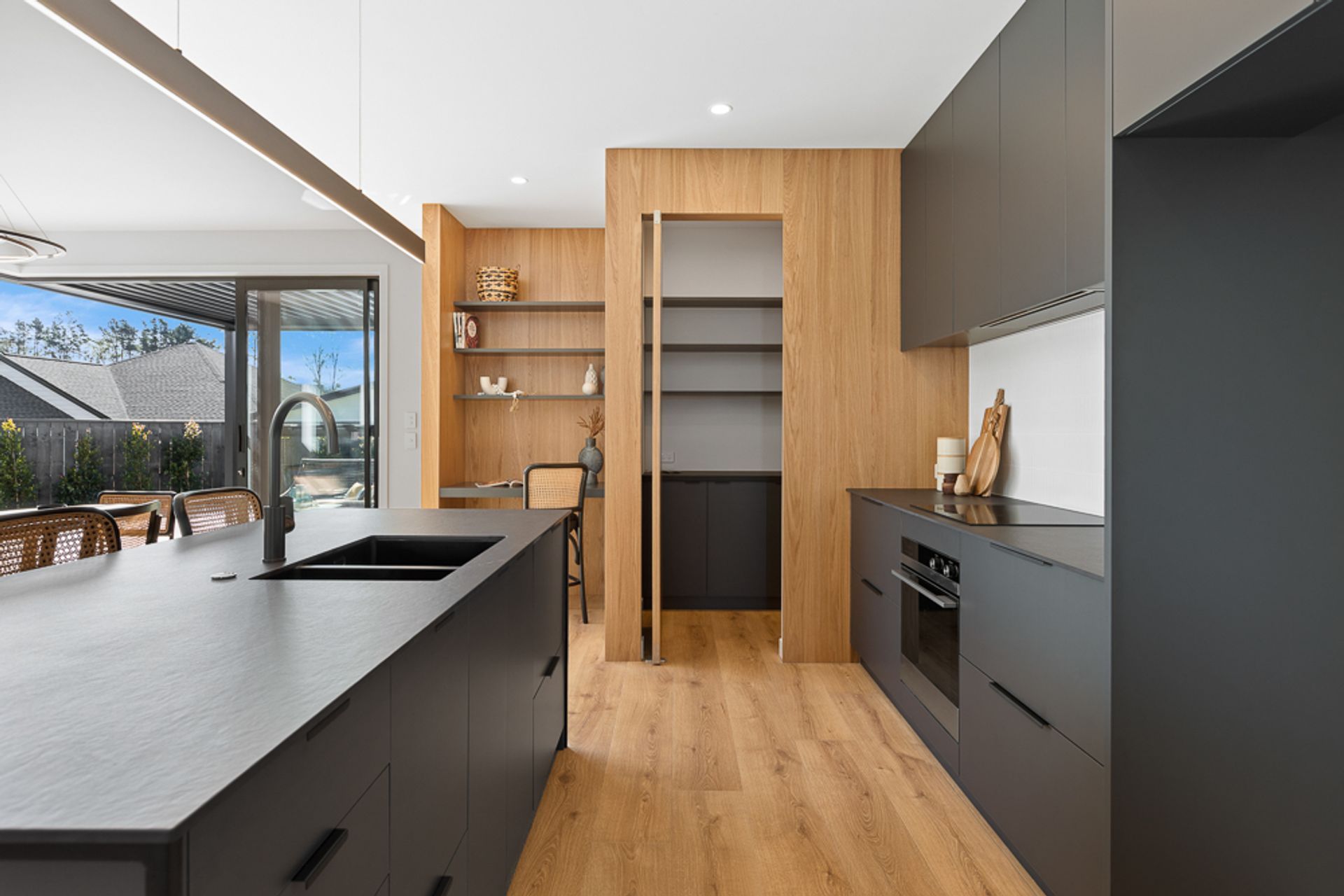 Black steel island, Dekton + Oak