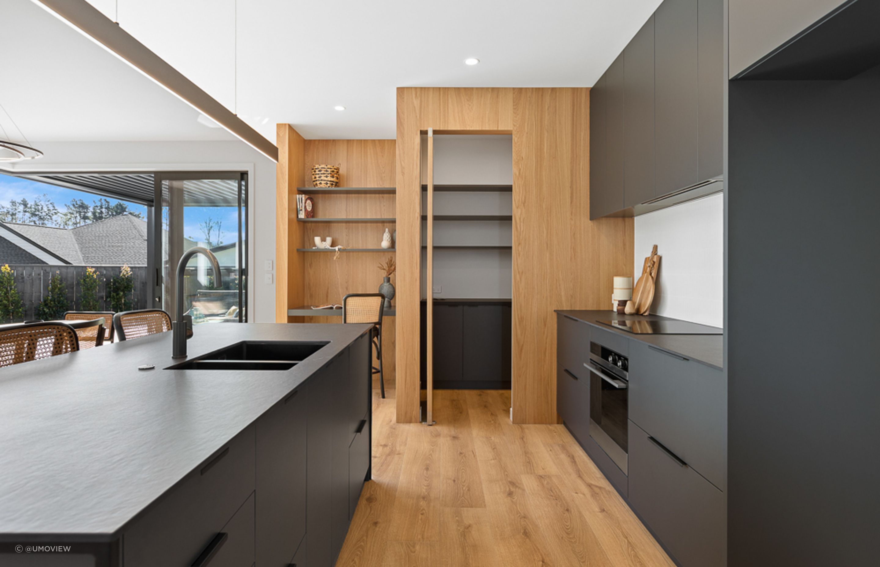 Black steel island, Dekton + Oak