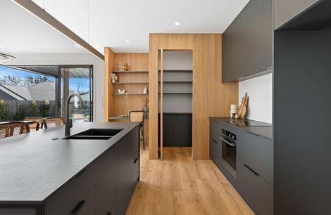 Black steel Kitchen Island with Dekton + Oak
