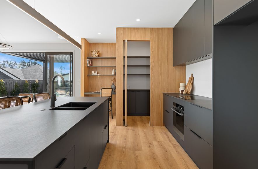 Black steel island, Dekton + Oak