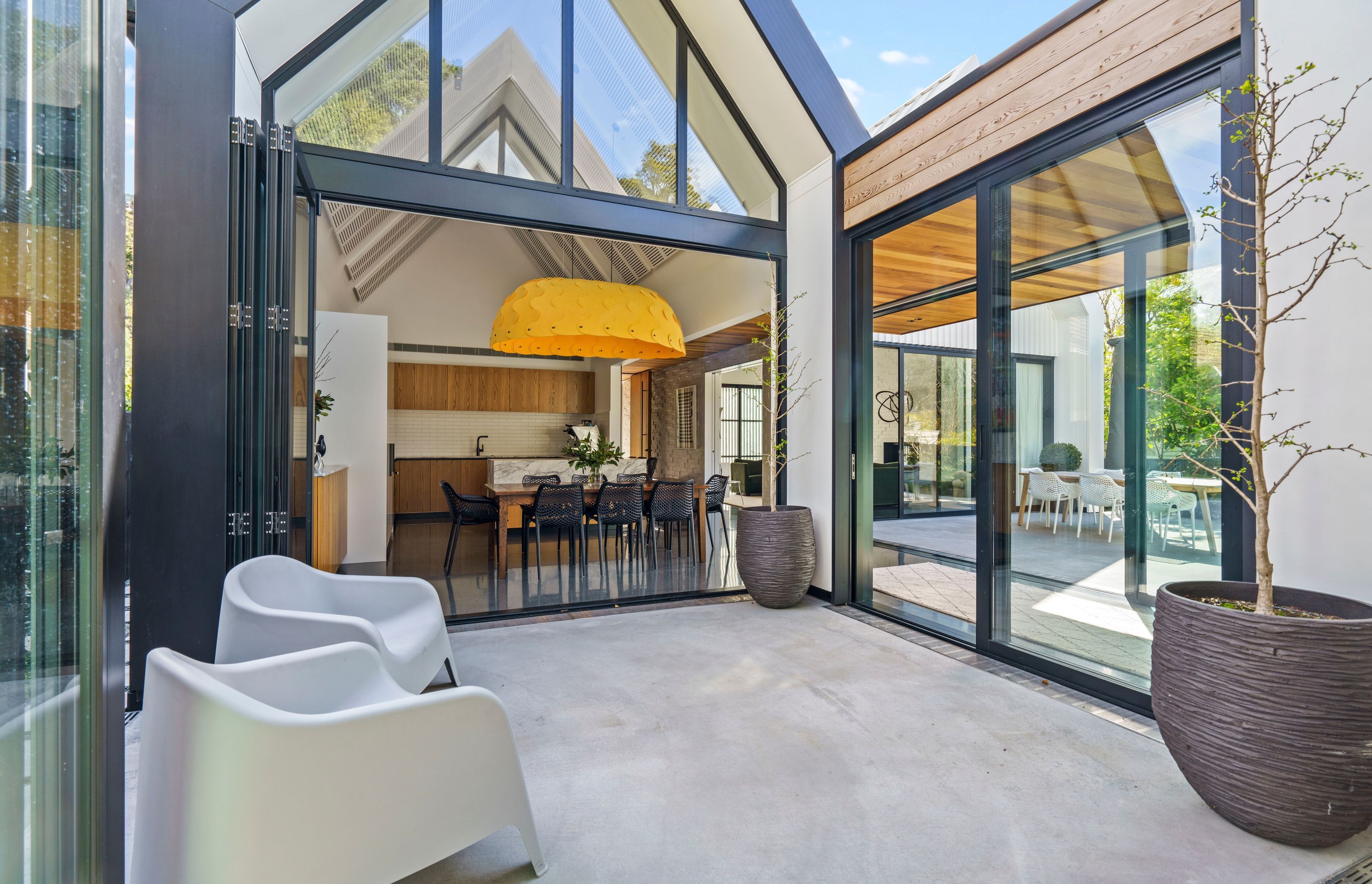 A small courtyard space adds a zen-like zone to the living area and allows for natural cross-ventilation of the home.