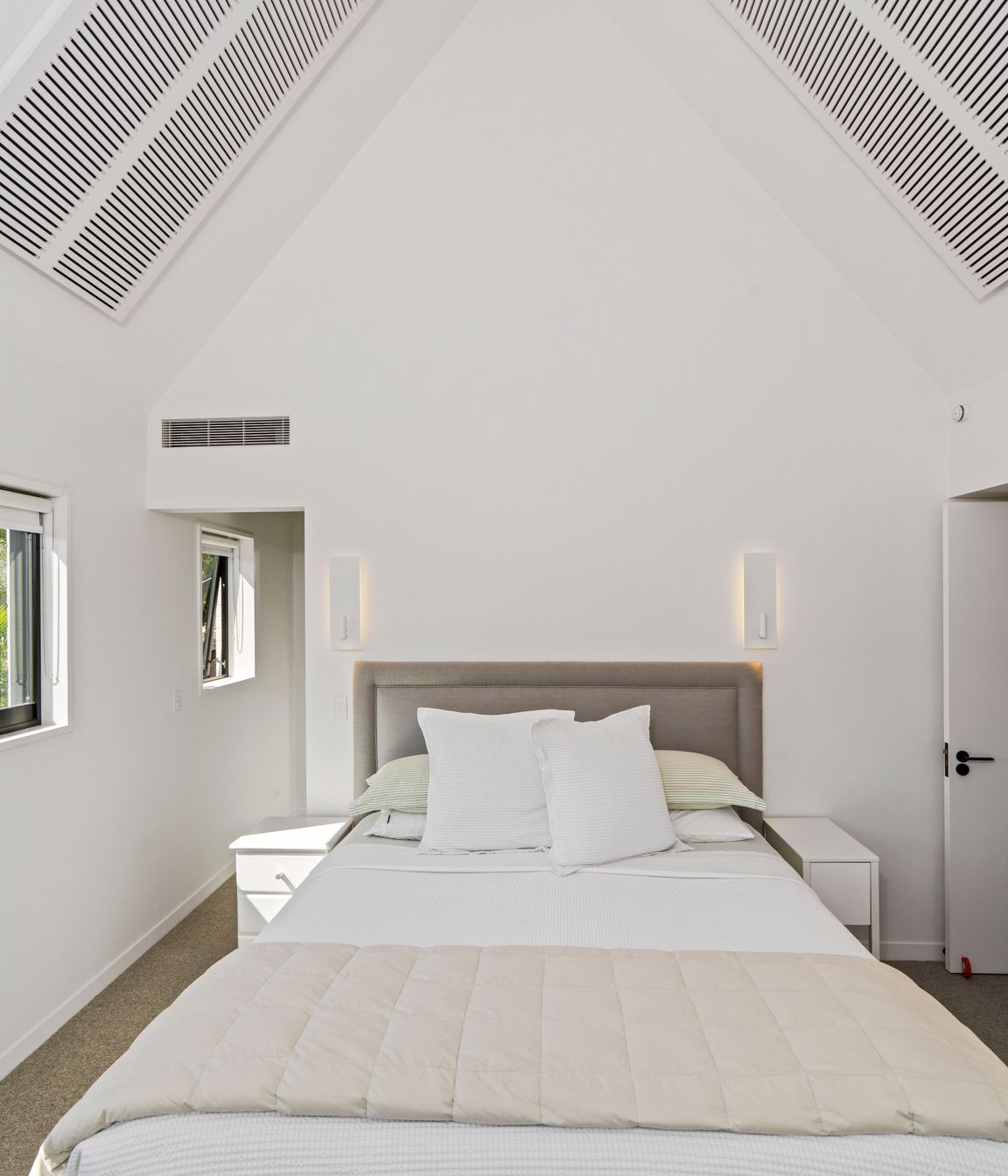 The main bedroom is a study in comfort with neutral tones providing a serene palette.