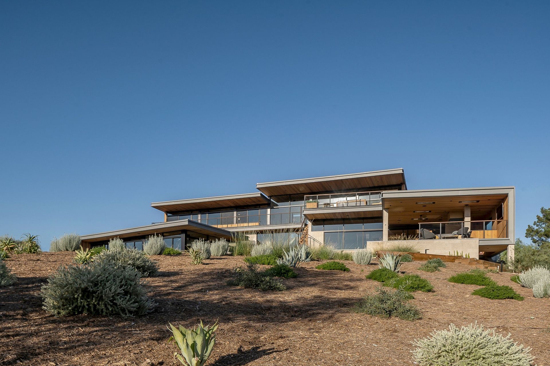 AO-HOUSEREAR-FACADEDAYDRONE04.jpg