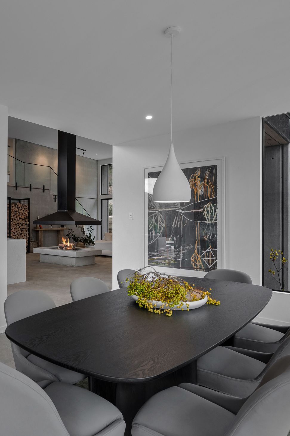 The dining room is a cosy space to the home. Styled to reflect the surrounding native landscape.