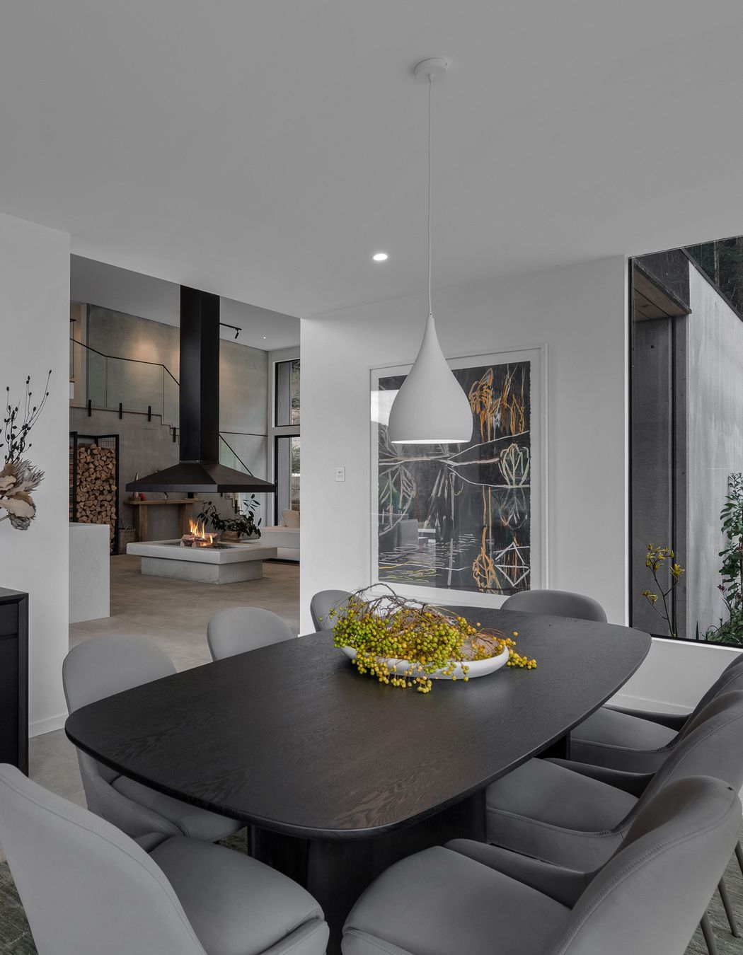 The dining room is a cosy space to the home. Styled to reflect the surrounding native landscape.