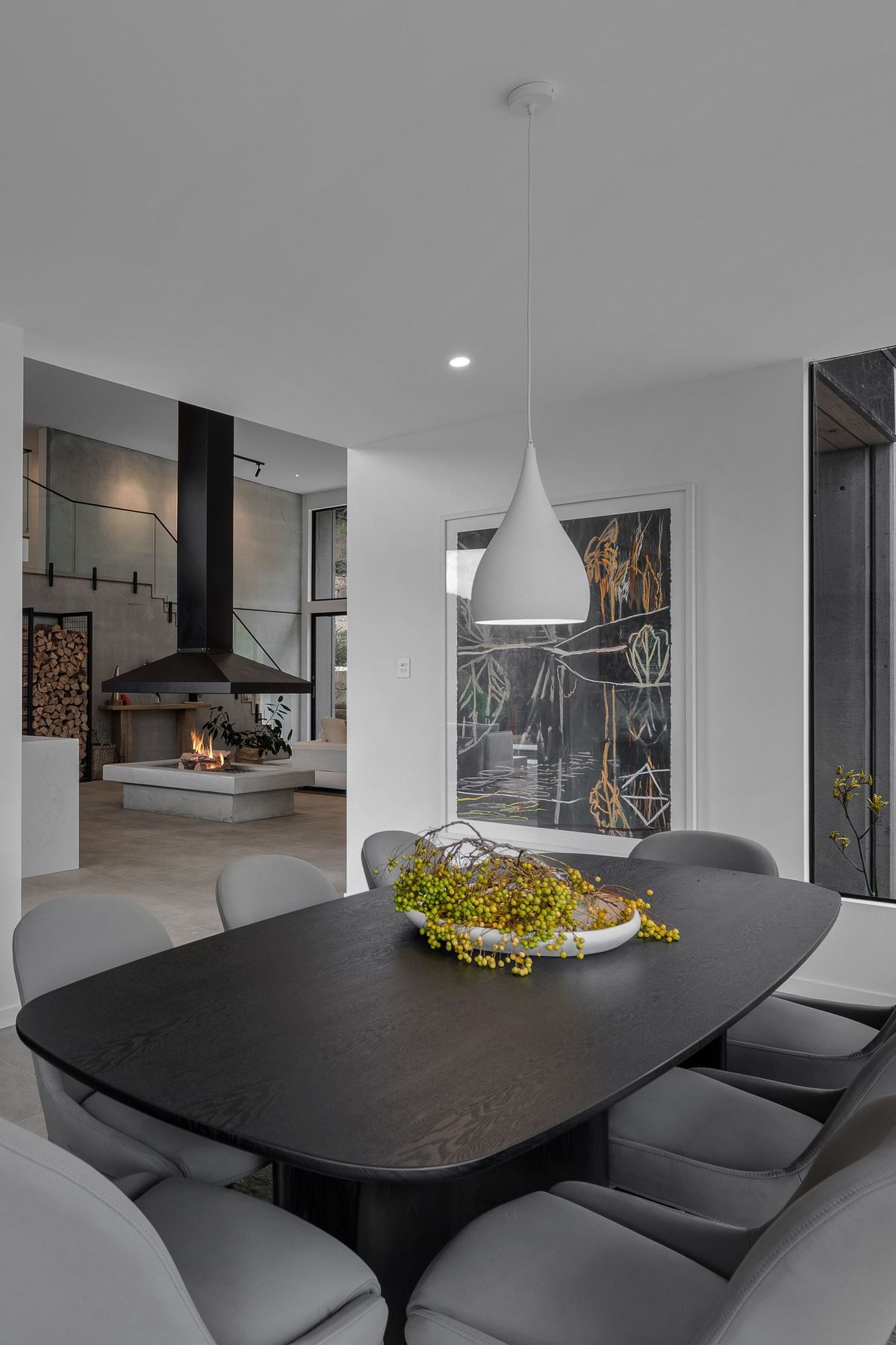 The dining room is a cosy space to the home. Styled to reflect the surrounding native landscape.