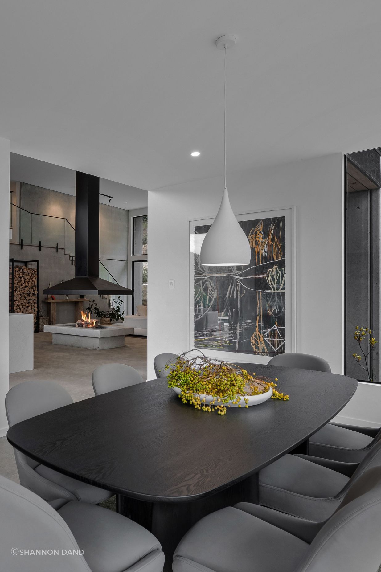 The dining room is a cosy space to the home. Styled to reflect the surrounding native landscape.