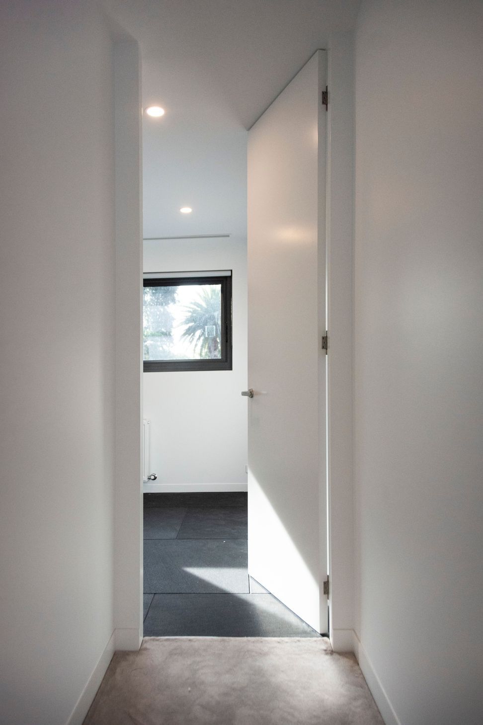 The opening to the upstairs gym framed by an EzyJamb SRC.