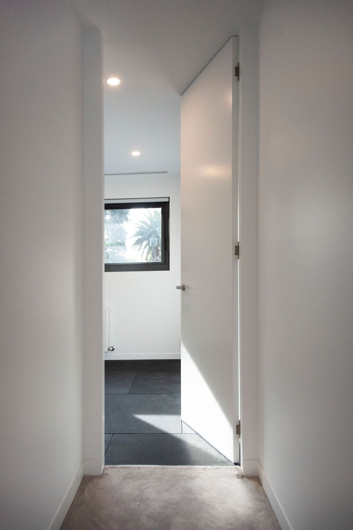 The opening to the upstairs gym framed by an EzyJamb SRC.