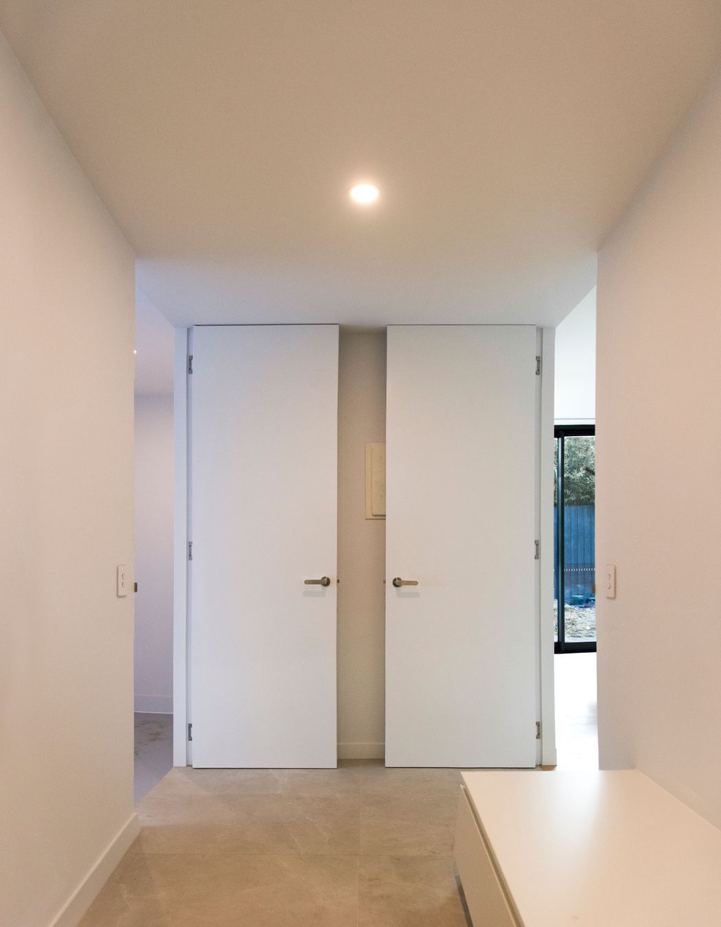 Two open EzyJamb framed doors in the home laundry.