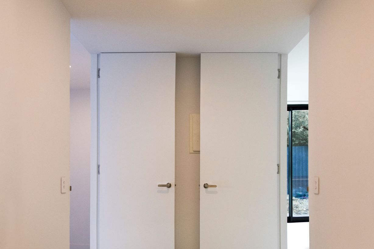 Two open EzyJamb framed doors in the home laundry.