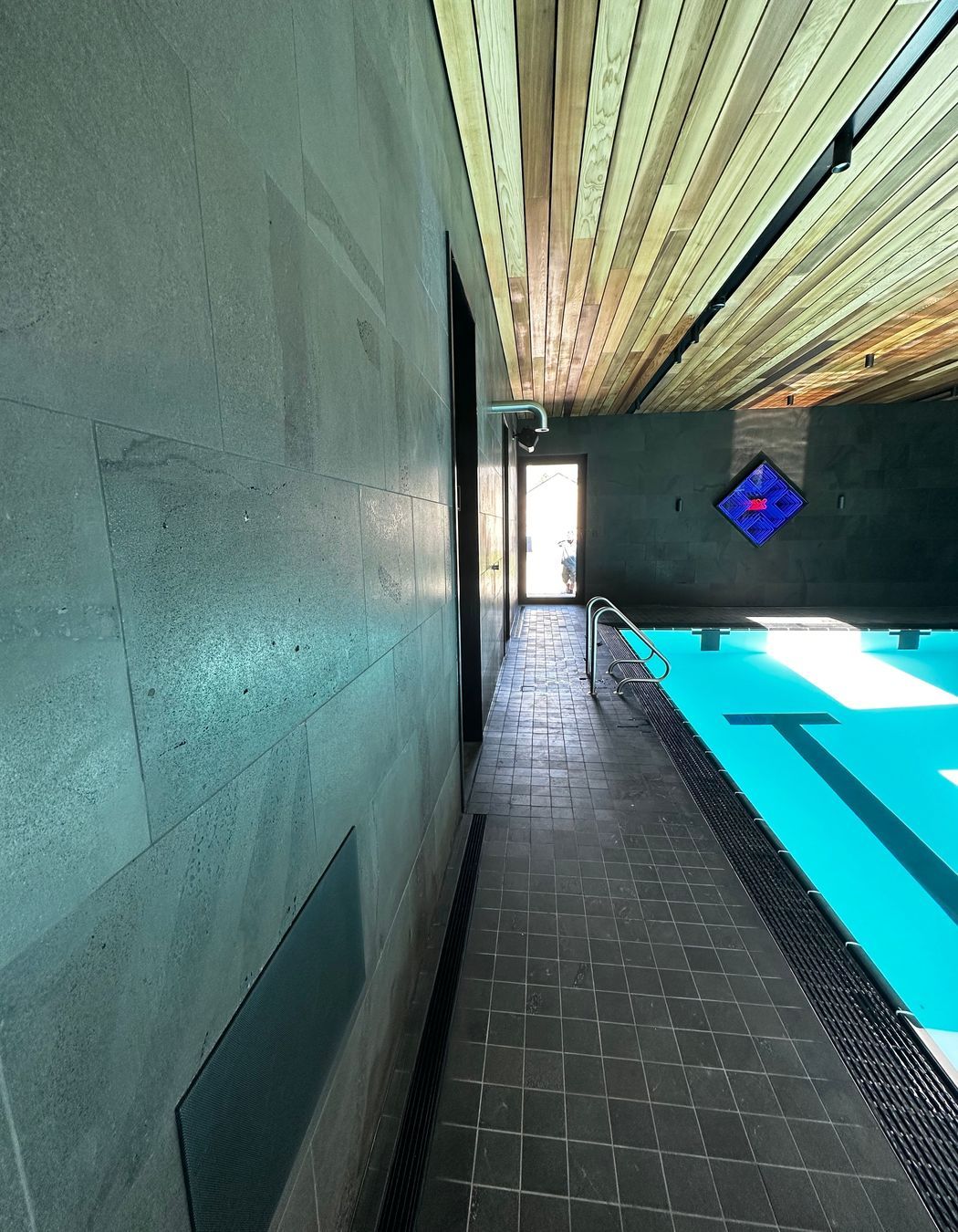 Pool tiling at Speargrass Flat Rd