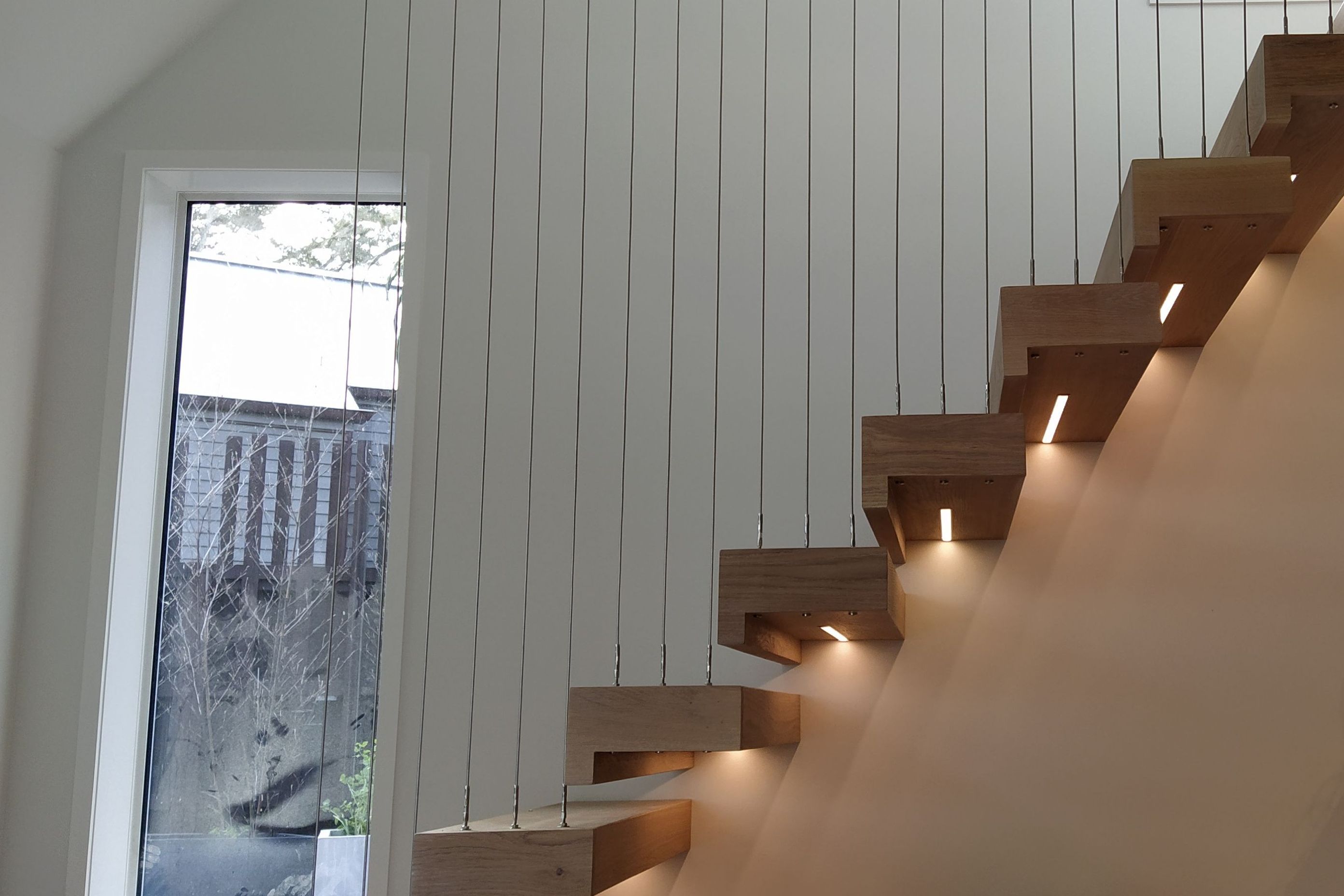 Floating stairs - residential wire balustrade infil