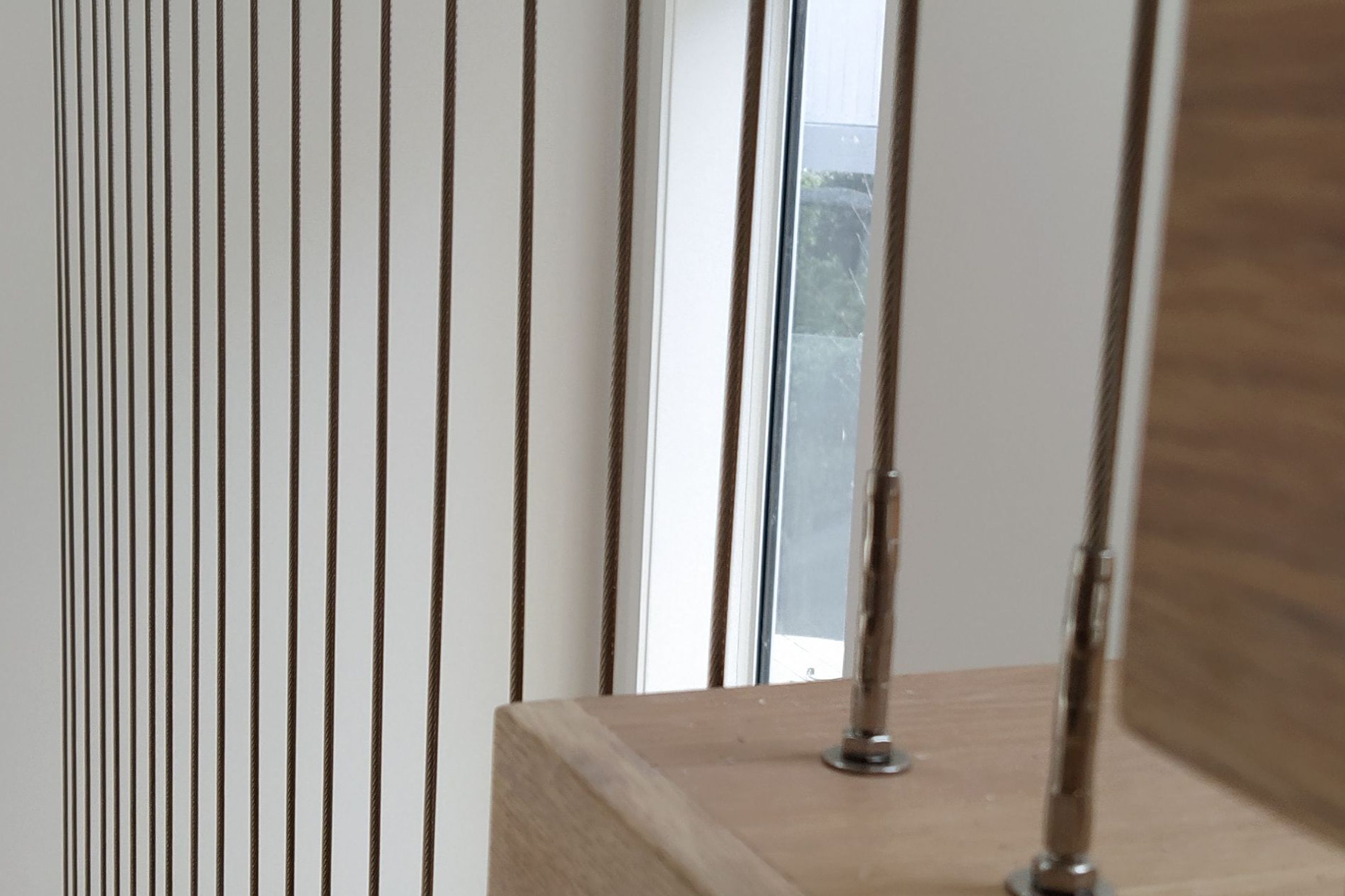 Floating stairs - residential wire balustrade infil