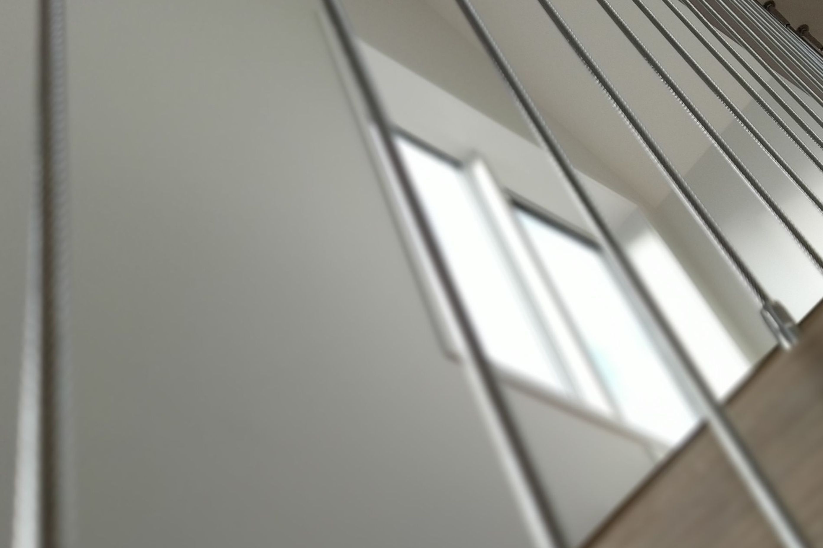 Floating stairs - residential wire balustrade infil