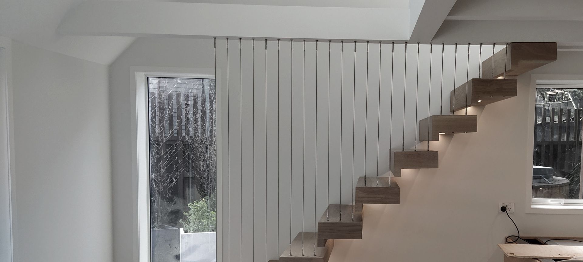 Floating stairs - residential wire balustrade infill banner