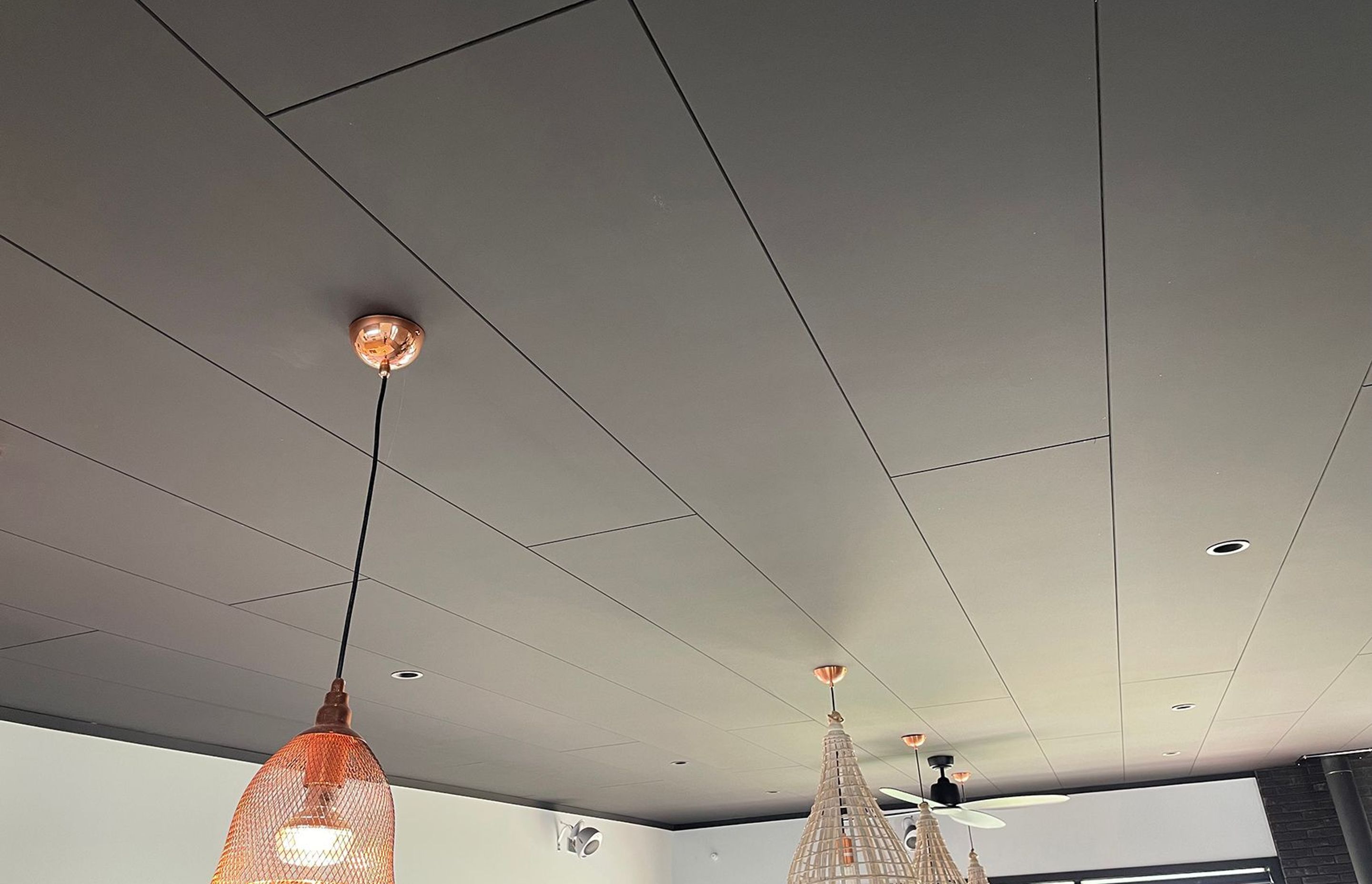 A bold black ceiling with Triboard TGV