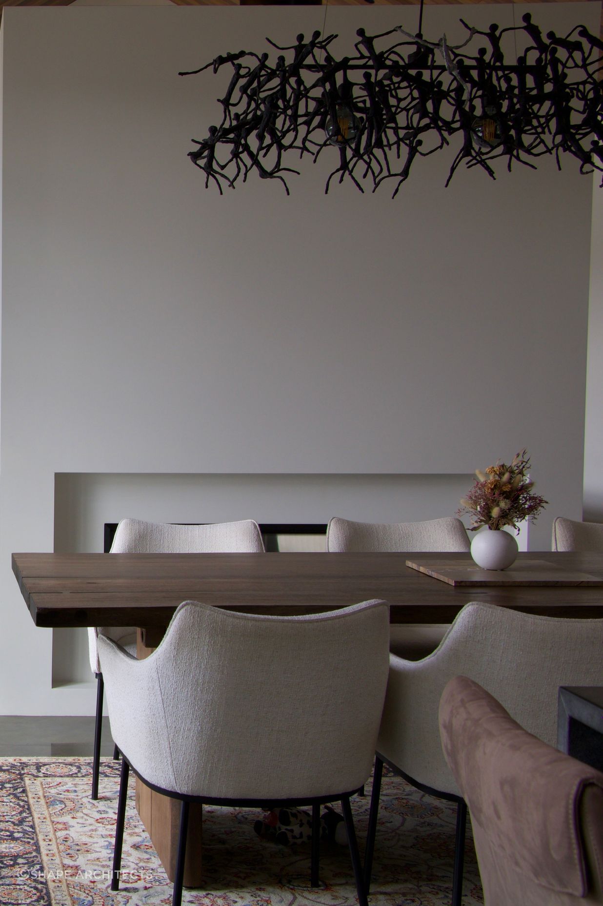 'Little People' chandelier over the dining table