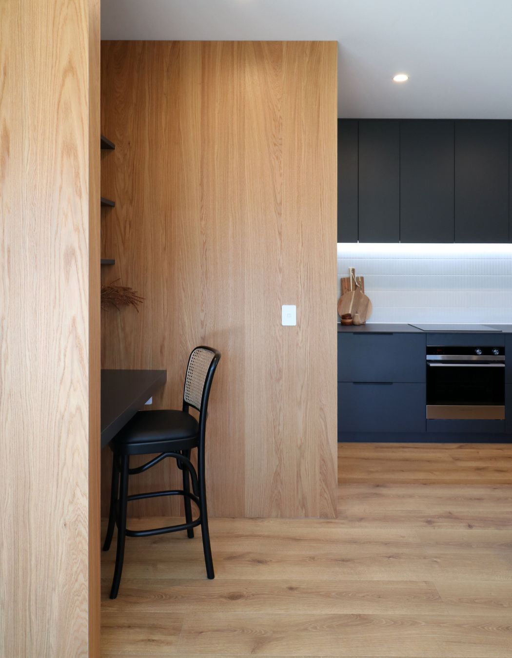 Black steel island, Dekton + Oak