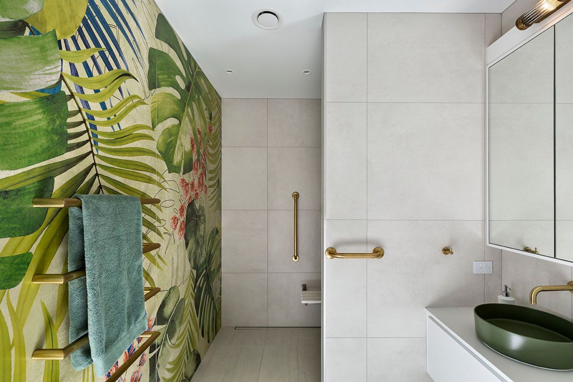 Feature tiles add vibrance to the bathroom.