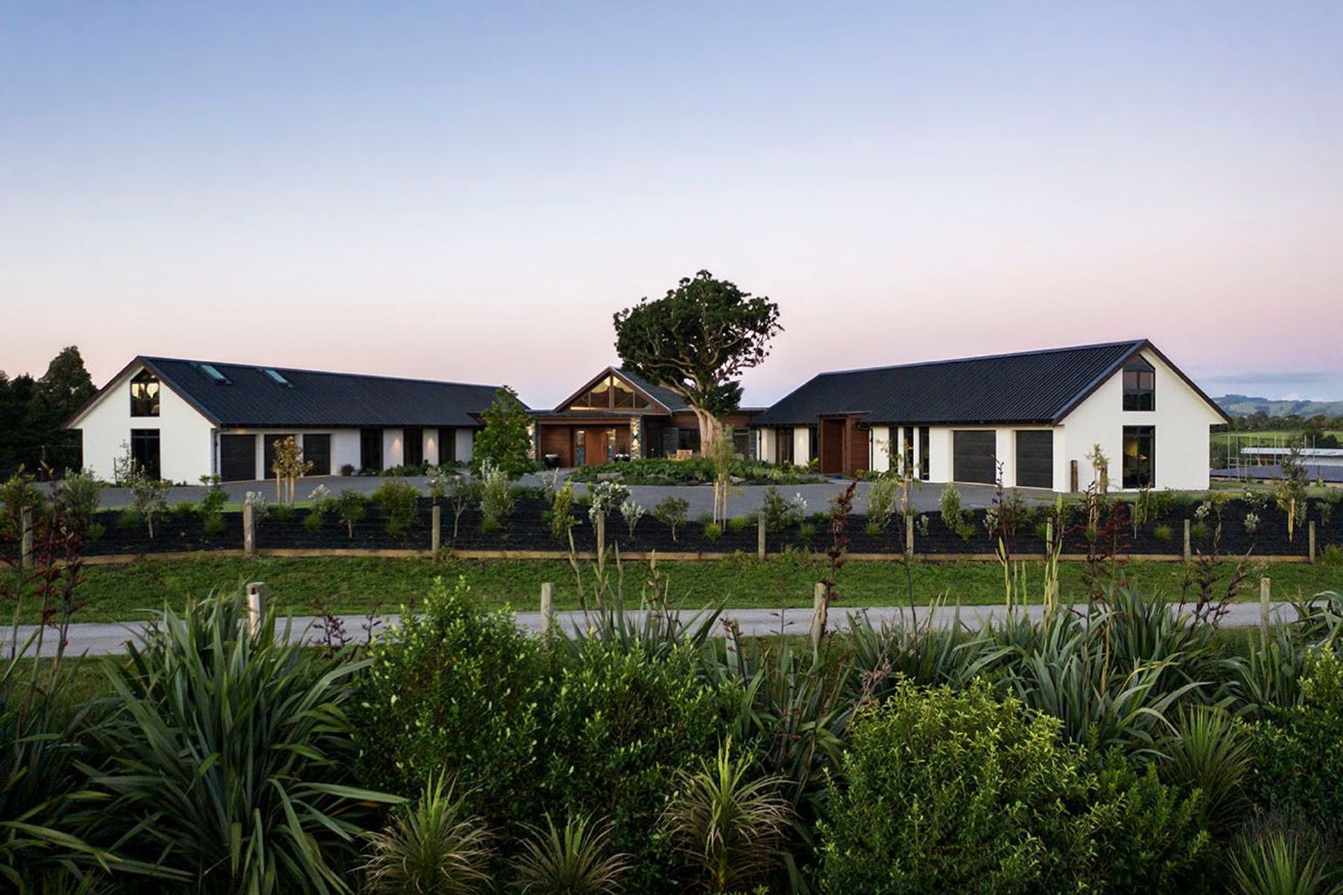 The Entry and adjacent pavilions pivot around a protected Puriri Tree which forms the focal point to the beautiful gardens on arrival.