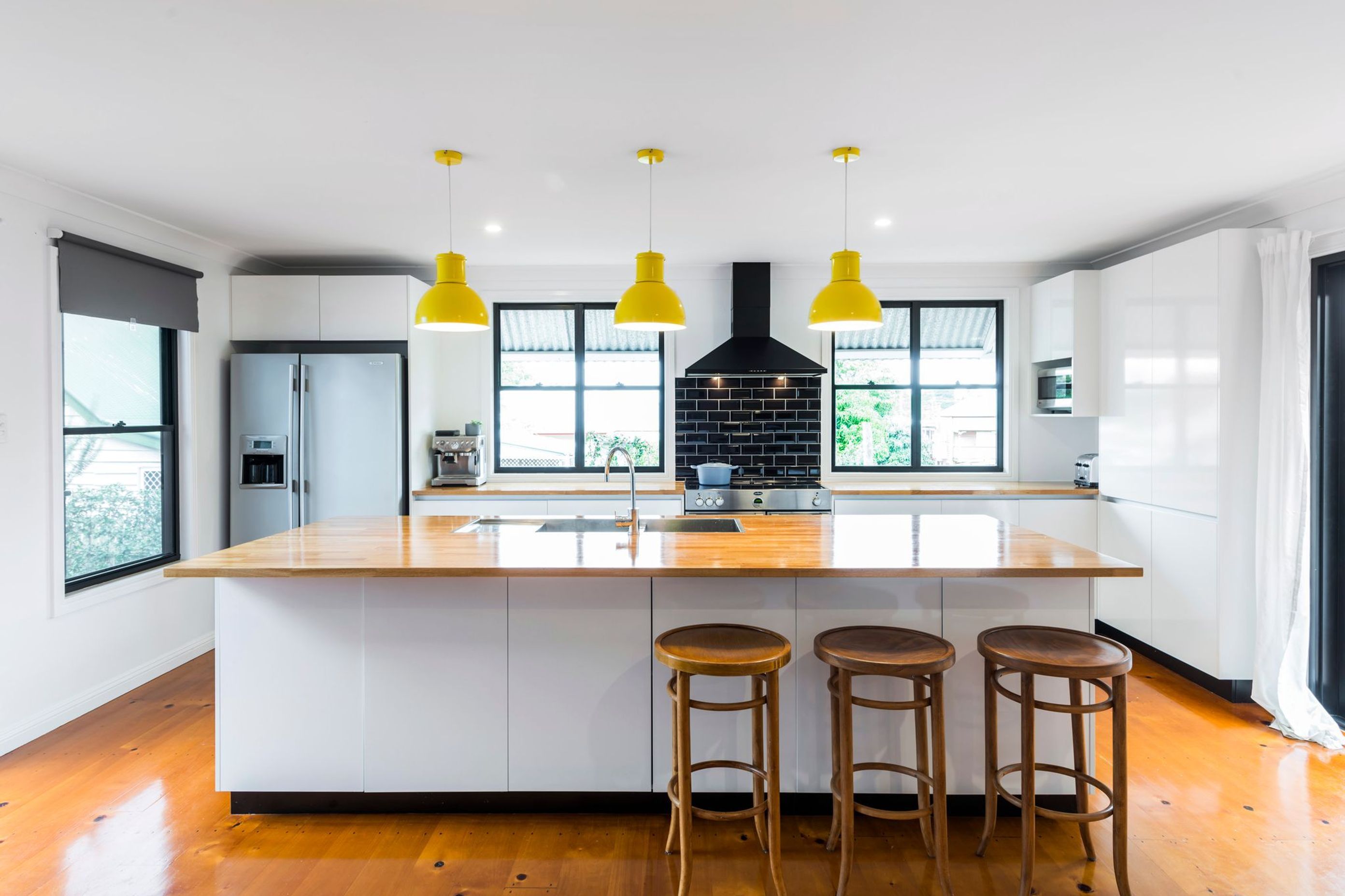 The kitchen is the central point for the family. The new wing features natrual light and cross breeze ventilation. The open plan space is surrounded by private spaces which cater beautifully for the overflow required for extended gatherings.