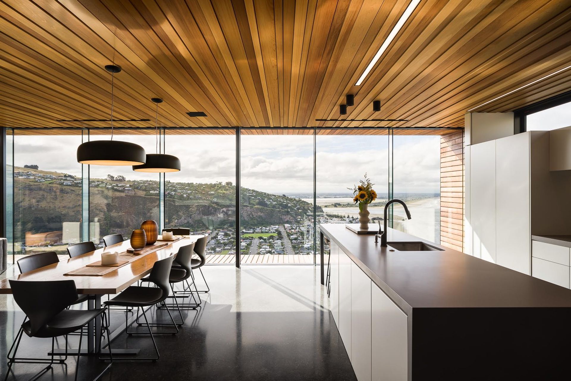 The deliberate use of timber on the ceiling is for acoustic benefits.