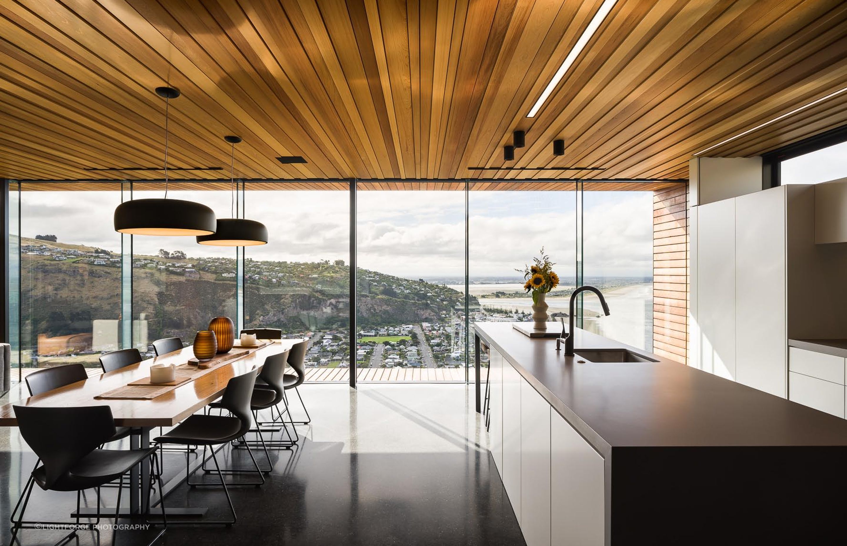 The deliberate use of timber on the ceiling is for acoustic benefits.
