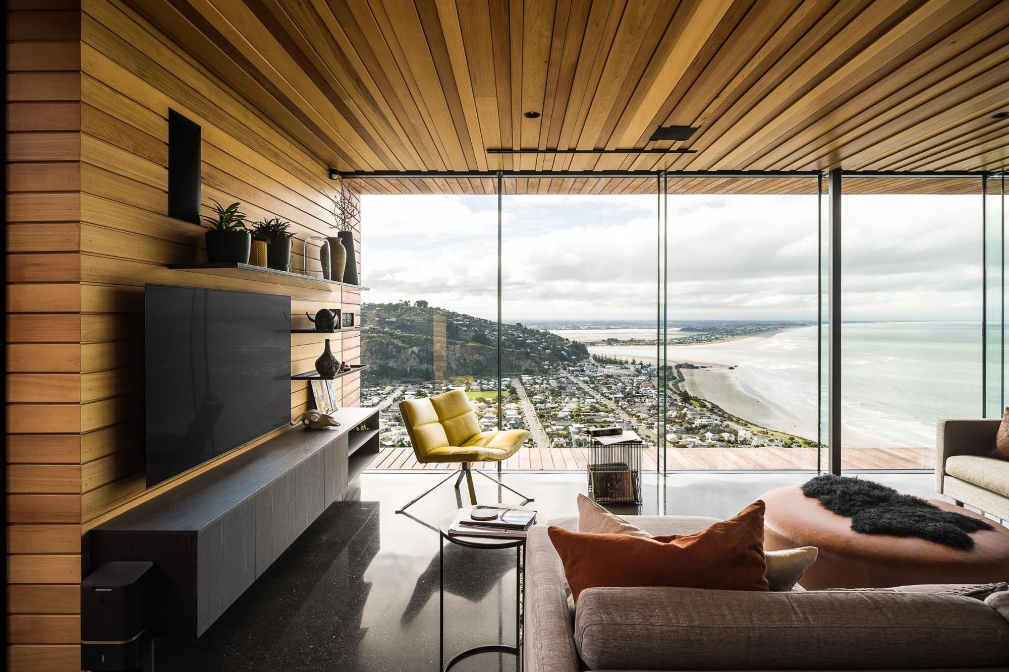 The polished concrete flooring captures the warmth of the afternoon sun.