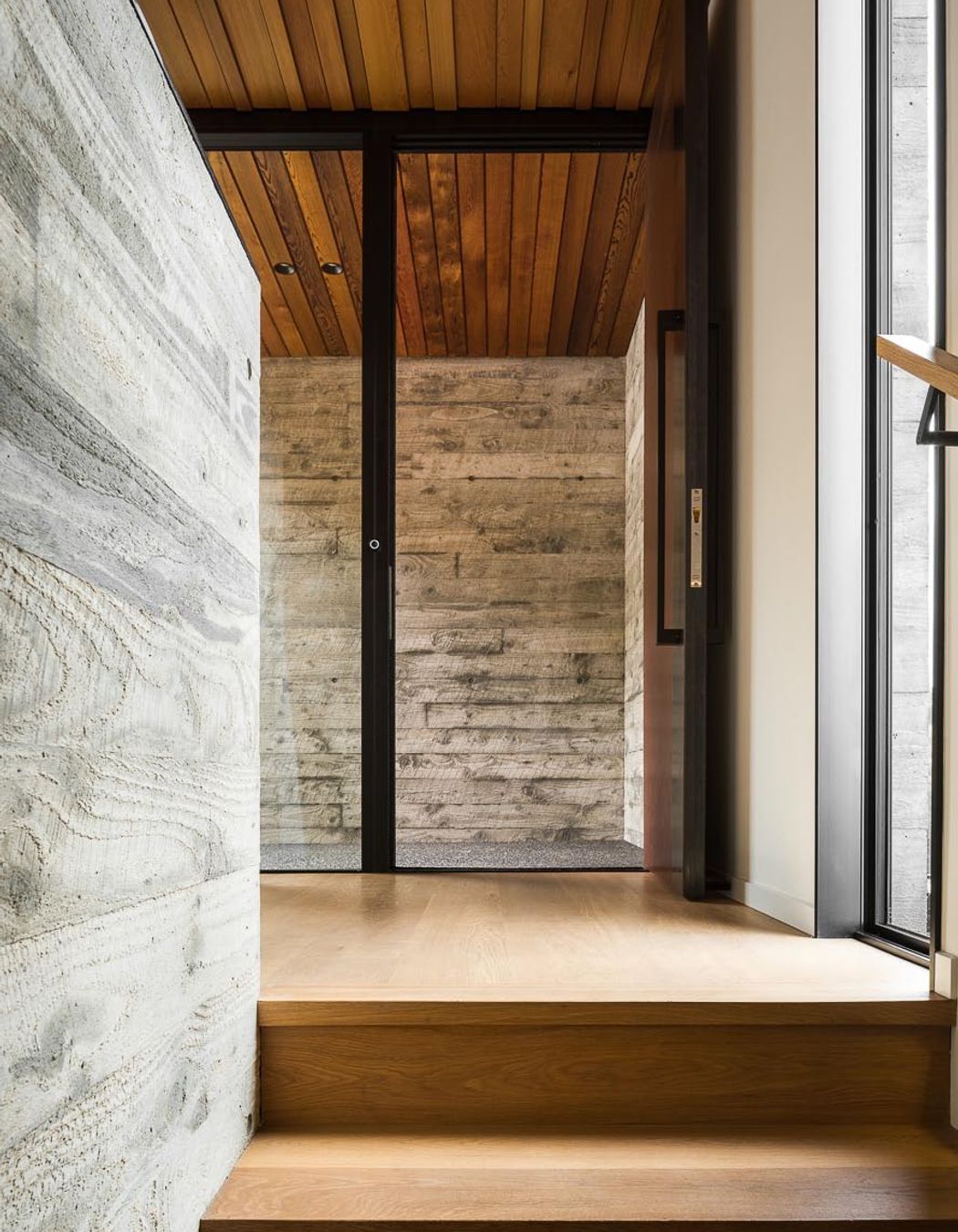 The exterior materiality continues through to the interior of the home.