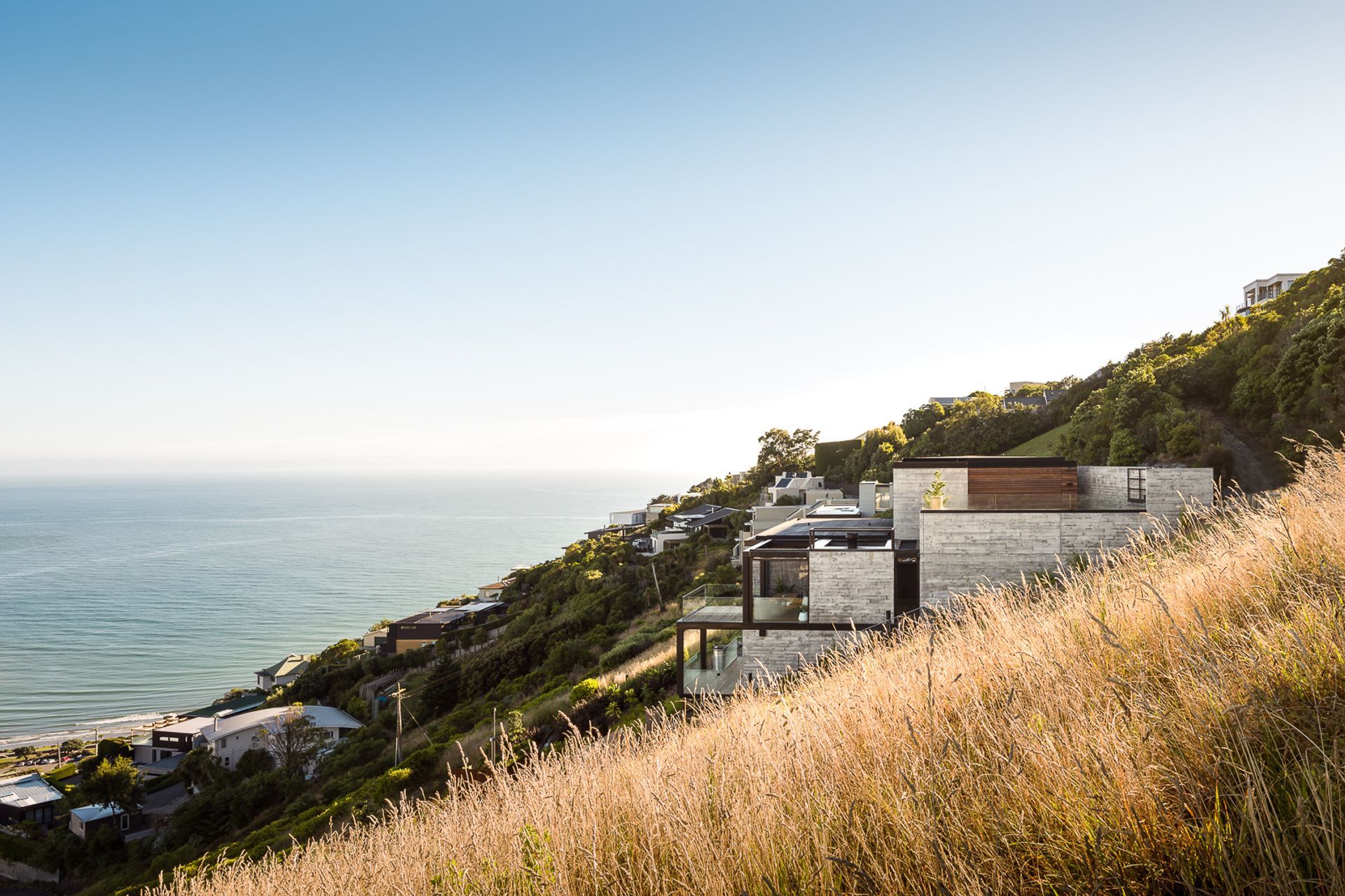 The home faces north-west with breathtaking views across the Pacific Ocean, returning along the Southern Alps over Christchurch city.
